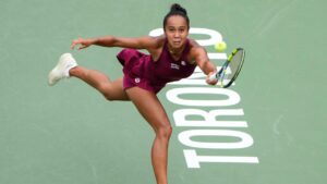 Canada's Leylah Fernandez hits a return to Mirra Andreeva during National Bank Open tennis action in Toronto, on Friday, Aug. 7, 2026. (Chris Young/CP)
