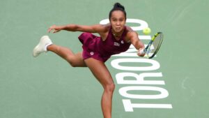 Canada's Leylah Fernandez hits a return to Mirra Andreeva during National Bank Open tennis action in Toronto, on Friday, Aug. 7, 2026. (Chris Young/THE CANADIAN PRESS)