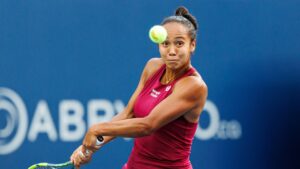 Leylah Fernandez of Canada returns the ball from Naomi Osaka of Japan during round of 16 National Bank Open Tennis action in Toronto, on Sunday, Aug. 9, 2026. (Keito Newman/CP)