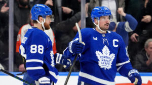 Toronto Maple Leafs William Nylander (88) celebrates his goal with teammate Auston Matthews (34) during third period NHL hockey action against the Philadelphia Flyers, in Toronto, Monday, March 2, 2026. (Frank Gunn/CP)