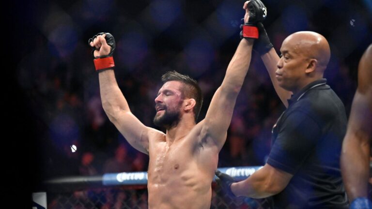 Mateusz Gamrot reacts after being declared the winner over Jalin Turner with a split decision in a UFC 285 mixed martial arts lightweight bout Saturday, March 4, 2023, in Las Vegas. (David Becker/AP)