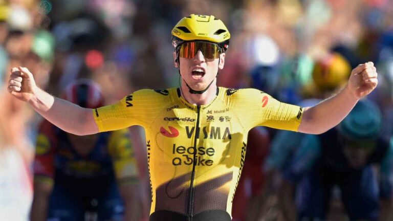 Britain's Matthew Brennan celebrates as he crosses the finish line to win the second stage of the La Vuelta cycling race, with start in Monaco and finish in Manosque, France. (Philippe Magoni/AP)