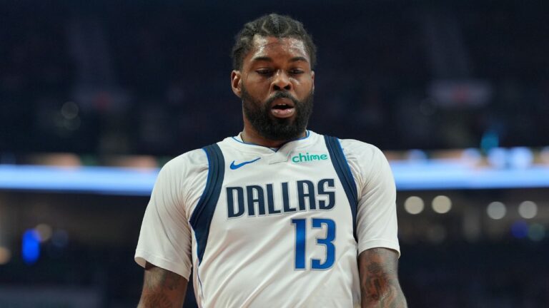 Dallas Mavericks forward Naji Marshall looks on during the first half of an NBA basketball game against the Portland Trail Blazers, Friday, March 27, 2026, in Portland, Ore. (Jenny Kane/AP)
