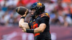 B.C. Lions quarterback Nathan Rourke throws a pass against the Hamilton Tiger-Cats during first half of CFL football action in Vancouver on Saturday, August 8, 2026. (Rich Lam/CP)