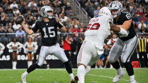 Las Vegas Raiders quarterback Fernando Mendoza (15) throws against the Arizona Cardinals during the first half of a preseason NFL football game, Thursday, Aug. 13, 2026, in Las Vegas. (David Becker/AP)