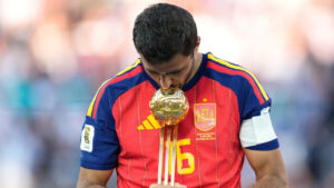 Spain's Rodri poses with the tournament's best player award at the end of the World Cup final soccer match between Spain and Argentina in East Rutherford, N.J., near New York, Sunday, July 19, 2026. (Ashley Landis/AP)