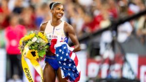 United States' Masai Russell celebrates after winning the women's 100-meter hurdles race, setting a new world record, at the Diamond League athletics meeting, Thursday, Aug. 27, 2026, in Zurich, Switzerland. (Jean-Christophe Bott/Keystone via AP)