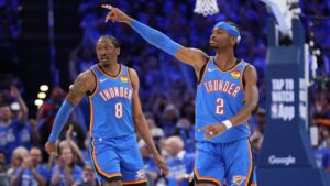 Oklahoma City Thunder guard Shai Gilgeous-Alexander (2) points near guard Jalen Williams (8) during the second half in Game 1 of a first-round NBA playoffs basketball series against the Phoenix Suns, Sunday, April 19, 2026, in Oklahoma City. (Nate Billings/AP)