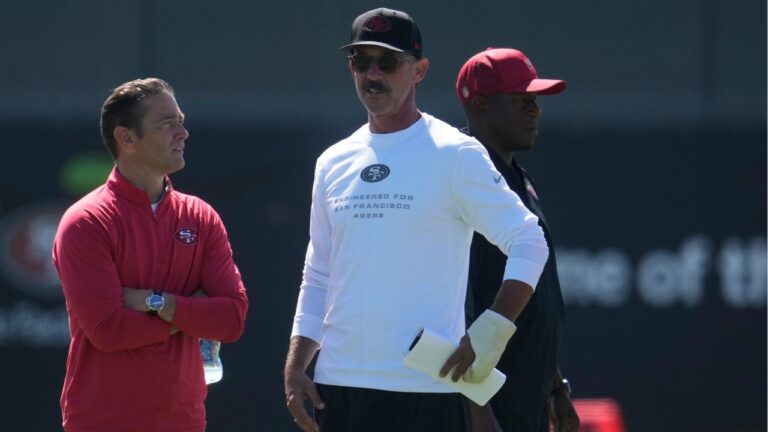San Francisco 49ers head coach Kyle Shanahan, middle, watches players run drills during the NFL football team's training camp, Monday, Aug. 3, 2026, in Santa Clara, Calif. (Jeff Chiu/AP)