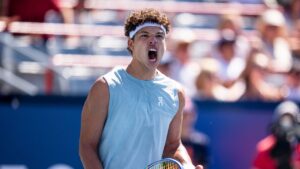 Ben Shelton of USA celebrates after defeating Jenson Brooksby of USA on day four of the National Bank Open tennis tournament in Montreal on Wednesday, August 5, 2026. (Christopher Katsarov/THE CANADIAN PRESS)