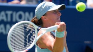 Poland's Iga Swiatek hits a return to Czechia's Sara Bejlek during National Bank Open action in Toronto on Tuesday August 4, 2026. (Chris Young/THE CANADIAN PRESS)