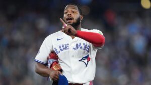 Toronto Blue Jays first baseman Vladimir Guerrero Jr. (27) reacts to the Boston Red Sox dugout after hitting into a double play during fifth inning American League MLB baseball action in Toronto on Wednesday, August 12, 2026. (Nathan Denette/THE CANADIAN PRESS)