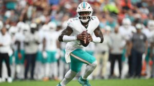 Miami Dolphins quarterback Malik Willis (2) aims a pass during the first half of an NFL preseason football game against the Washington Commanders, Friday, Aug. 14, 2026, in Landover, MD. (Nick Wass/AP)