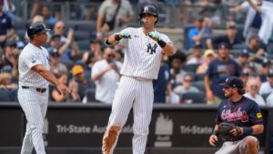New York Yankees' Spencer Jones reacts after hitting an RBI triple during the fifth inning of a baseball game against the Atlanta Braves, Saturday, Aug. 8, 2026, in New York. (Yuki Iwamura/AP)