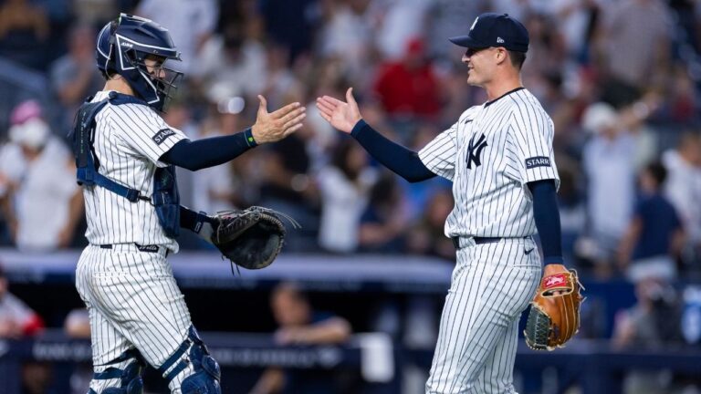 New York Yankees catcher Austin Wells, left, and pitcher Brendan Beck, right, celebrate after their team's win over the Boston Red Sox in the second baseball game of a doubleheader, Saturday, Aug. 29, 2026, in New York. (Corey Sipkin/AP)