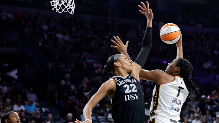 Indiana Fever centre Aliyah Boston (7) goes to the basket against Las Vegas Aces centre A'ja Wilson (22) during the first half in Game 1 of an WNBA basketball first-round playoff series Sunday, Sept. 27, 2026, in Las Vegas. (Steve Marcus/AP)