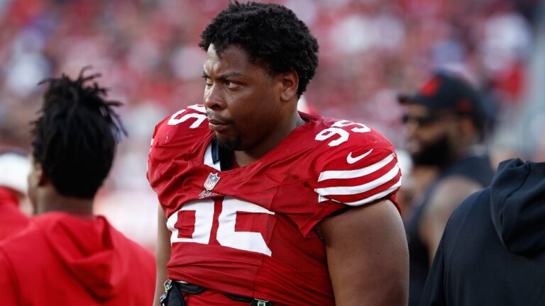 San Francisco 49ers defensive lineman Alfred Collins (95) watches from the sideline during the first half of a preseason NFL football game against the Tennessee Titans, Thursday, Aug. 13, 2026, in Santa Clara, Calif. (AP Photo/Kelley L. Cox)