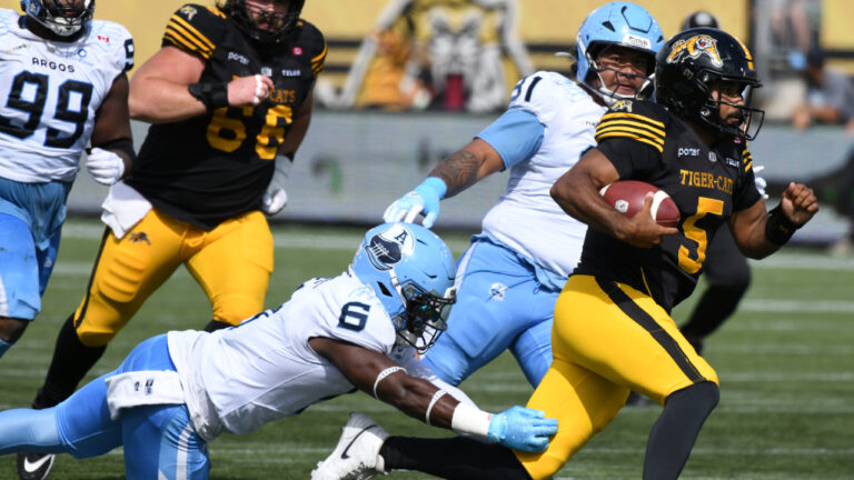 Hamilton quarterback Tre Ford (5) runs for a touchdown during first half CFL football action in Hamilton on Monday, Sept. 7, 2026. (Barry Gray/CP)
