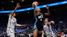 Reese has double double in playoff debut as Dream beat Mystics