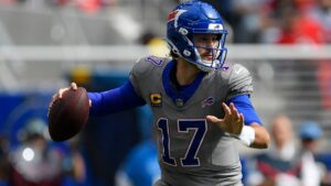 Buffalo Bills quarterback Josh Allen looks to pass during the first half of an NFL football game against the Los Angeles Chargers, Sunday, Sept. 27, 2026, in Orchard Park, N.Y. (AP Photo/Adrian Kraus)