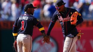 Atlanta Braves' Ronald Acuna Jr., right, celebrates with Ozzie Albies, left, after a baseball game against the Philadelphia Phillies, Sunday, Sept. 6, 2026, in Philadelphia. (AP Photo/Derik Hamilton)