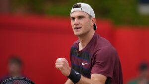Britain's Jack Draper reacts during the quarterfinal match of the Queen's Club Championships tennis tournament against Brandon Nakashima of the United States in London, Friday, June 20, 2025. (Kin Cheung/AP)