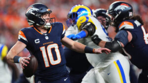 Denver Broncos quarterback Bo Nix looks to pass against the Los Angeles Rams during the first half of an NFL football game Sunday, Sept. 27, 2026, in Denver. (David Zalubowski/AP)