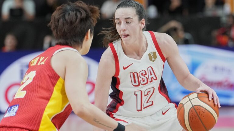 China's Li Yuan guards United States' Caitlin Clark during the Women's Basketball World Cup match between China and the United States in Berlin, Friday, Sept. 4, 2026. (AP Photo/Ebrahim Noroozi)