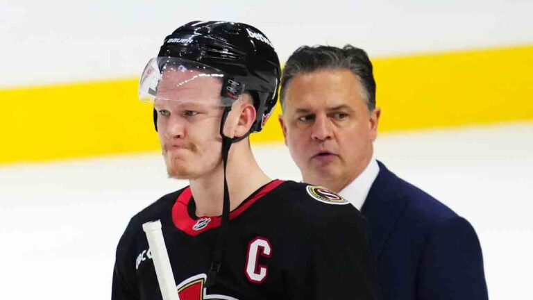 Ottawa Senators' Brady Tkachuk (7) and head coach Travis Green wait to shake hands after losing to the Toronto Maple Leafs in NHL playoff hockey action in Ottawa on Thursday, May 1, 2025. (Sean Kilpatrick/CP)