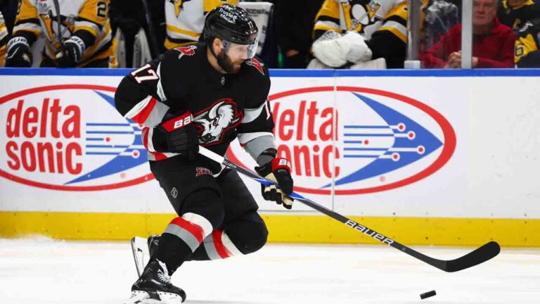 Buffalo Sabres left wing Jason Zucker carries the puck up ice during the first period of an NHL hockey game against the Pittsburgh Penguins, Thursday, Feb. 5, 2026, in Buffalo, N.Y. (Jeffrey T. Barnes/AP)
