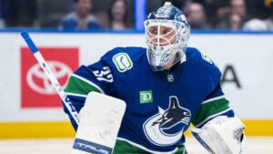 Vancouver Canucks goaltender Kevin Lankinen (32) looks on during the second period of an NHL hockey game against the Carolina Hurricanes in Vancouver, on Wednesday, March 4, 2026. (Ethan Cairns/CP)