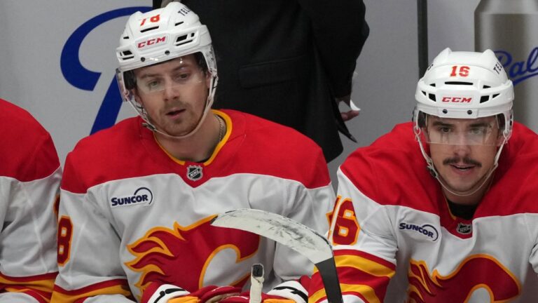 Calgary Flames left wing Brennan Othmann and centre Morgan Frost. (AP Photo/David Zalubowski)