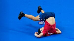 United States' Ben Shelton falls after returning the ball to Czechia's Jiri Lehecka during the Davis Cup second round qualifier match between the Czech Republic and the United States, in Prague, Friday, Sept. 18, 2026. (AP Photo/Petr David Josek)