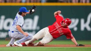 Texas Rangers' Corey Seager, right, steals second base ahead of the tag by Toronto Blue Jays second baseman Josh Smith during the first inning of a baseball game Friday, Sept. 18, 2026, in Arlington, Texas. (Julio Cortez/AP)