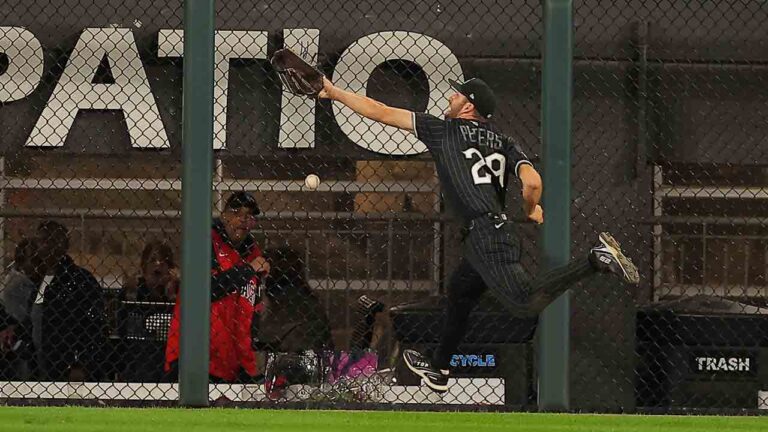 Chicago White Sox's Tristan Peters misses a ball hit by Detroit Tigers' Kevin McGonigle during the fifth inning of a baseball game, Friday, Sept. 18, 2026, in Chicago. (Melissa Tamez/AP)