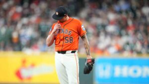 Houston Astros starting pitcher Hunter Brown reacts after Atlanta Braves' Michael Harris II reached base on a fielding error during the first inning of a baseball game, Sunday, Sept. 20, 2026, in Houston. (Karen Warren/AP)