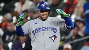 Toronto Blue Jays' George Springer celebrates after hitting an RBI single during the first inning of a baseball game against the Baltimore Orioles, Monday, Sept. 21, 2026, in Baltimore. (Stephanie Scarbrough/AP)