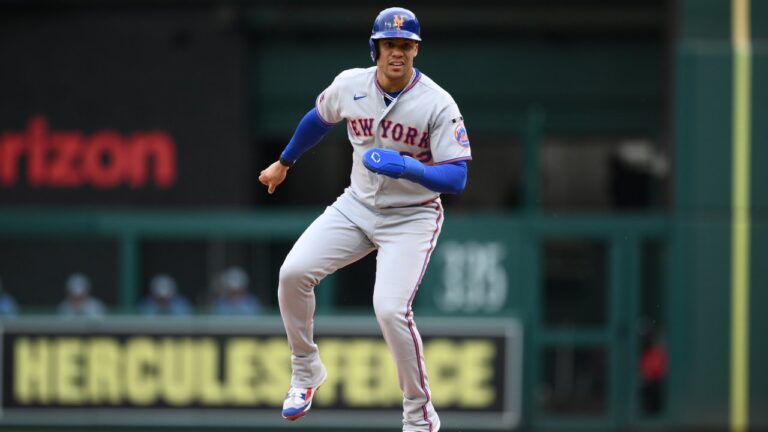 New York Mets' Juan Soto takes a lead from first base during the first inning of a baseball game against the Washington Nationals, Saturday, Sept. 26, 2026, in Washington. (AP Photo/Nick Wass)