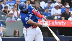 Toronto Blue Jays' Vladimir Guerrero Jr. (27) flies out against the Cincinnati Reds during third inning MLB baseball action in Toronto on Saturday, Sept. 26, 2026. (Jon Blacker/CP)