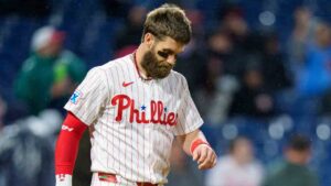 Philadelphia Phillies' Bryce Harper reacts to strike out to end the sixth inning of a baseball game against the Tampa Bay Rays, Saturday, Sept. 26, 2026, in Philadelphia. (Chris Szagola/AP)