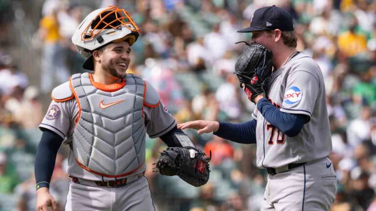 Houston Astros catcher Yainer Diaz, left, meets with pitcher Ethan Pecko (70) during the fourth inning of a baseball game against the Athletics, Sunday, Sept. 27, 2026, in West Sacramento, Calif. (Sara Nevis/AP)
