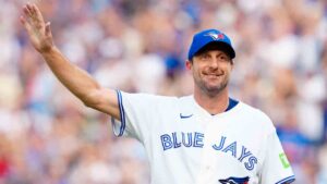 Toronto Blue Jays pitcher Max Scherzer (31) reacts to fans after he was pulled from the game against the Cincinnati Reds during eighth inning MLB baseball action in Toronto on Sunday, Sept. 27, 2026. (Frank Gunn/CP)