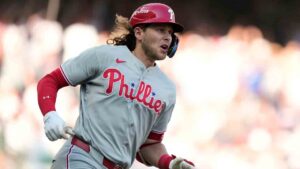 Philadelphia Phillies' Alec Bohm watches his home run against the Atlanta Braves in the 10th inning during Game 2 of baseball's National League Wild Card Series Wednesday, Sept. 30, 2026, in Atlanta. (Brynn Anderson/AP)