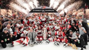 The Carolina Hurricanes pose for photos after a win over the Vegas Golden Knights in Game 6 of the NHL hockey Stanley Cup Final series, Sunday, June 14, 2026, in Las Vegas. (John Locher/AP)