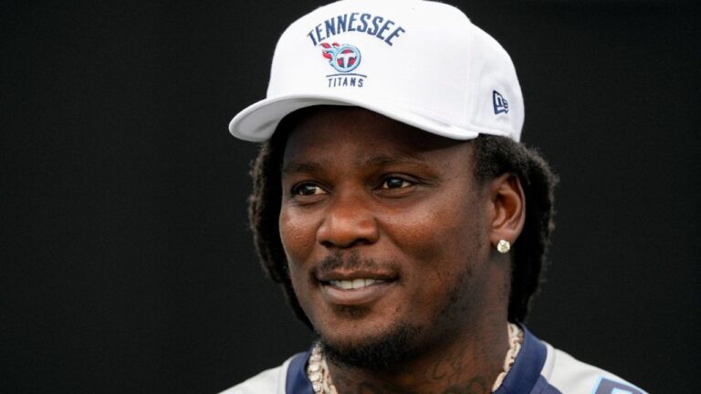 Former Tennessee Titans running back Chris Johnson visits the field during the second half of an NFL football game against the New York Jets, Sept. 15, 2024, in Nashville, Tenn. (George Walker IV/AP)