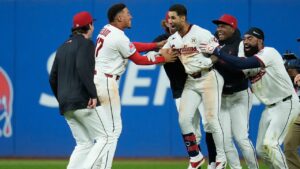 Cleveland Guardians' Brayan Rocchio, center, celebrates with teammates after hitting a game winning double in the ninth inning of a baseball game against the Chicago White Sox in Cleveland, Tuesday, Sept. 15, 2026. (Sue Ogrocki/AP)