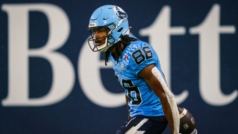 Toronto Argonauts wide receiver Damonte Coxie (86) reacts after scoring a touchdown against the Hamilton Tiger-Cats during second half CFL action in Toronto, on Saturday, Aug. 22, 2026. (Keito Newman/CP)