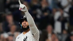 New York Yankees' Luis García Jr. points as he crosses home after hitting a solo home run against the Boston Red Sox during the fourth inning in Game 2 of baseball's American League Wild Card Series, Wednesday, Sept. 30, 2026, in New York. (Yuki Iwamura/AP)