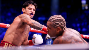 Ryan Garcia, left, punches Conor Benn in their welterweight championship fight on Saturday, Sept. 12, 2026, in Las Vegas. (Ian Maule/AP)