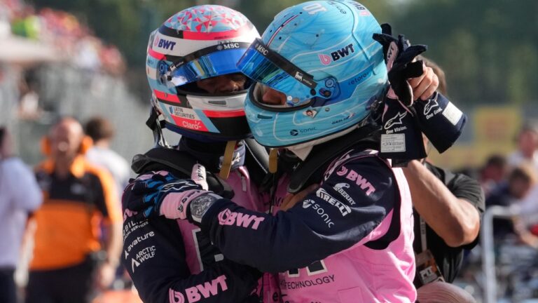 Alpine driver Pierre Gasly of France, right, celebrates his pole position with his teammate Franco Colapinto after the qualifying session ahead of the Italian Formula One Grand Prix, in Monza, Italy, Saturday, Sept. 5, 2026. (AP Photo/Luca Bruno)